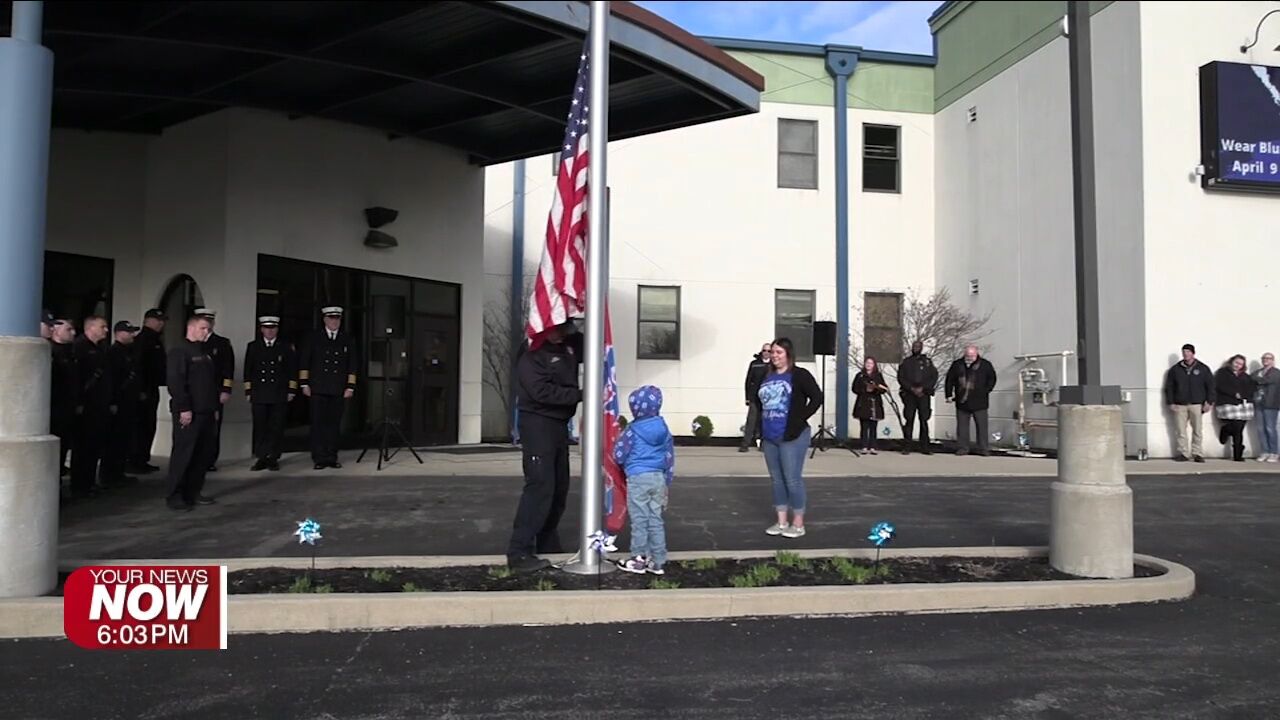 Flag-raising ceremony honors victims, calls for action against child abuse